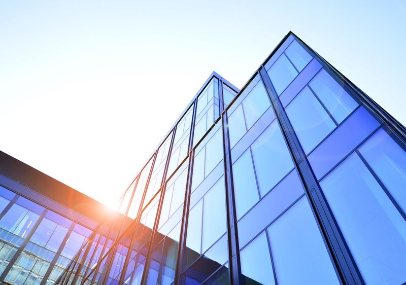 Modern,Office,Building,With,Glass,Facade.,Transparent,Glass,Wall,Of